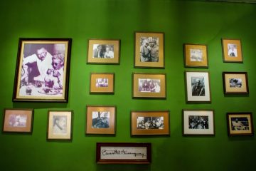 Wall of photos of Ernest Hemingway