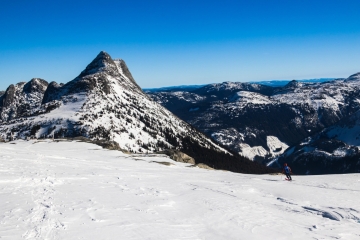 Skier with Needle Peak