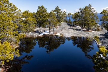 A small pool of water on peak 3